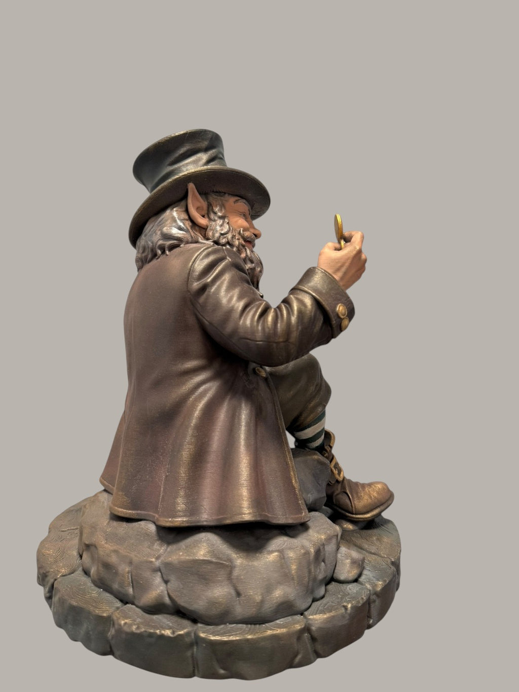 The Leprechaun — Keeper of Secrets sculpture, rear three-quarter view