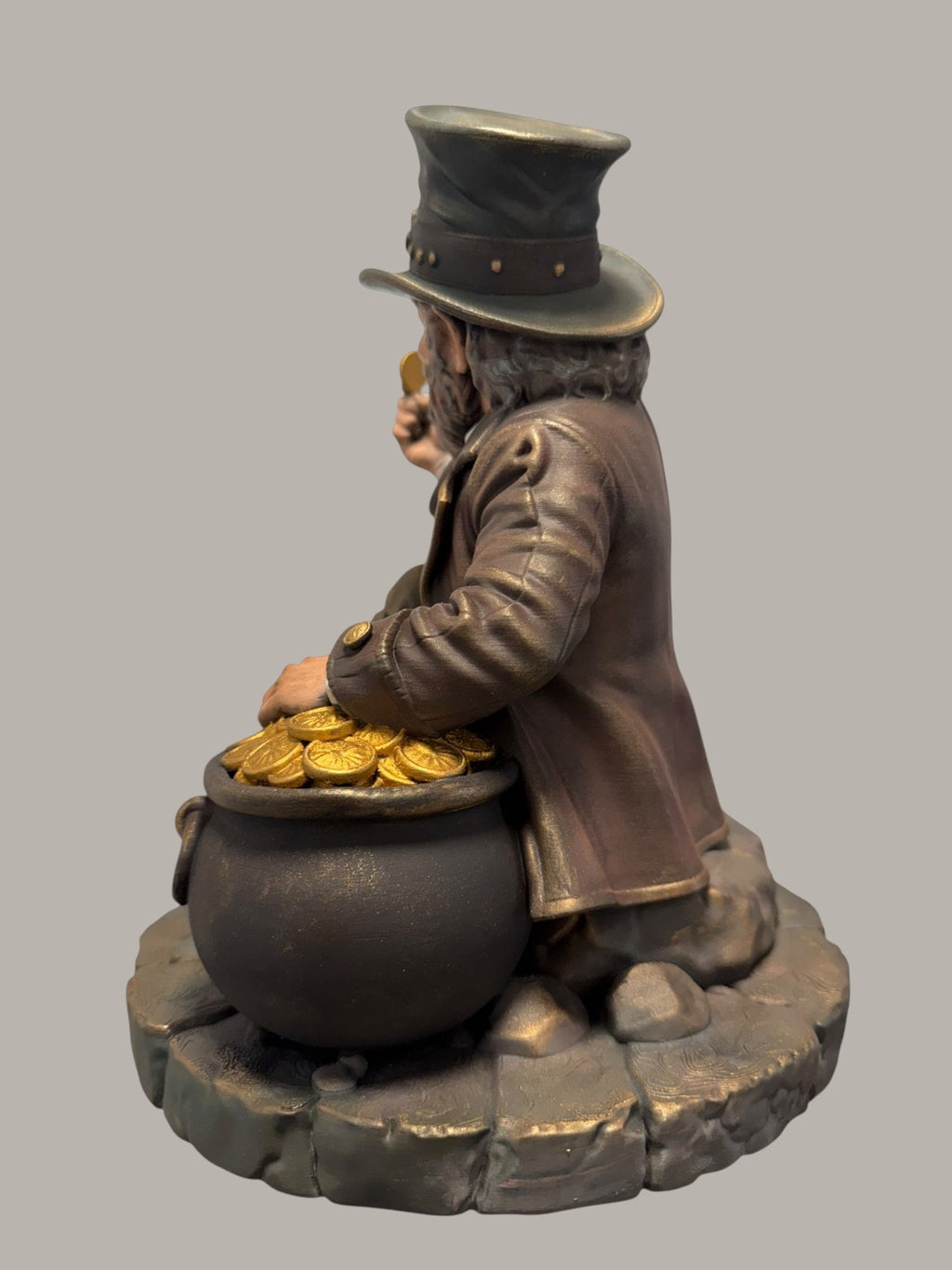 The Leprechaun — Keeper of Secrets sculpture, side view with pot
